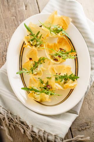 Tartelettes au fromage de chèvre, à la pistache et au miel